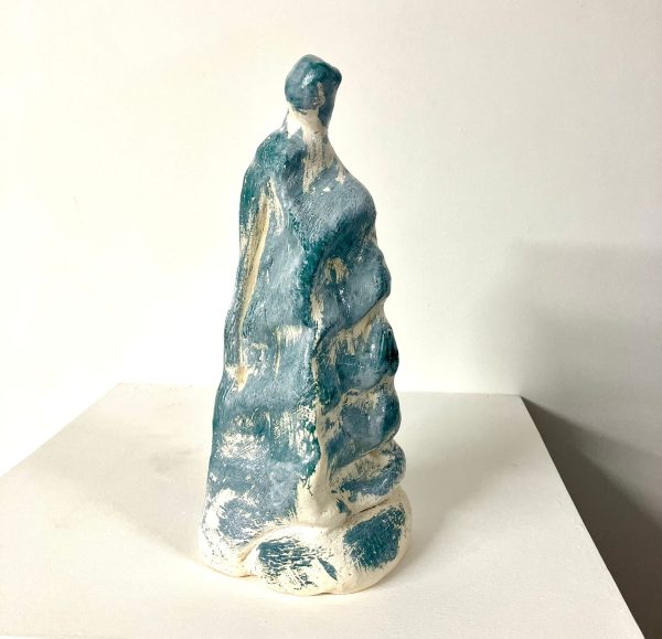 Ceramic figure with rippled blue glaze