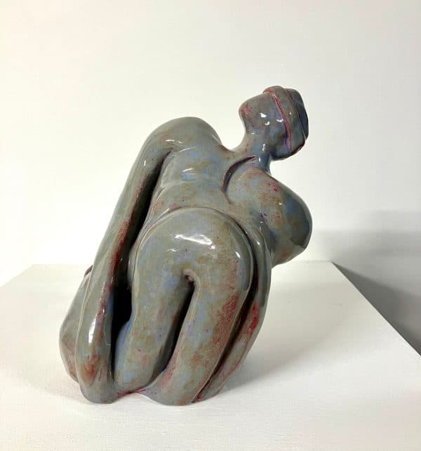 Ceramic figure with blindfold